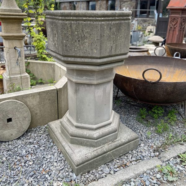 Antique stone font